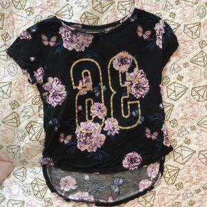 A black floral shirt